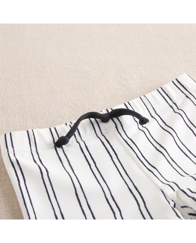 Baby boy's swimsuit in white with black stripes